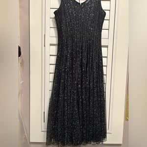 Elegant treasure ....glamour!!Very impressive look, silver splashes, lined